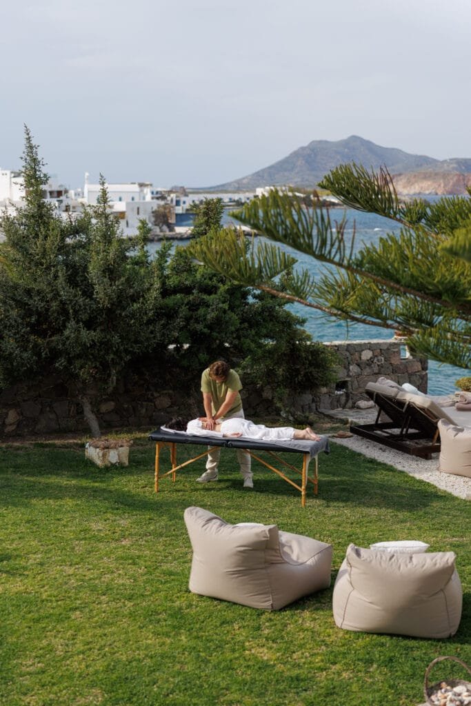 outdoor physiotherapy session in milos with sea view