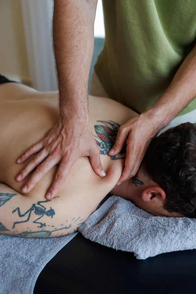trigger point therapy applied on shoulder muscle